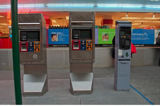 Two MetroCard fare collectors and a coin fare collector